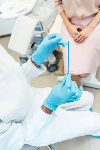 Woman having test for sexually transmitted disease with doctor — Stock Image Woman having test for sexually transmitted disease with doctor Stock Photo