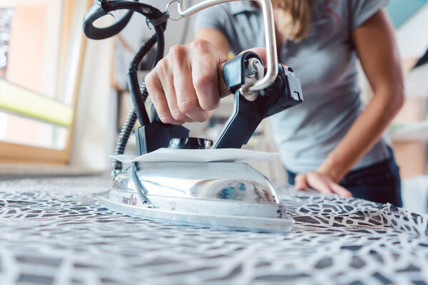 Tailor ironing fabric