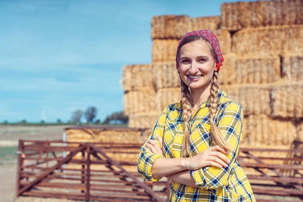 Woman standing proud on her farm — Stock Photo, Image