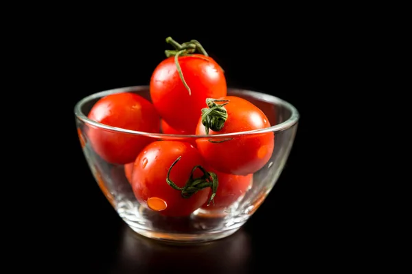 Cherry tomatoes in glass bowl — Stock Photo, Image