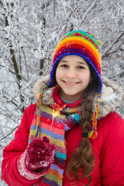 Girl standing in winter clothes with sparkles — Stock Photo, Image