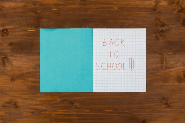 Back to school message written on open notebook — Stock Photo, Image