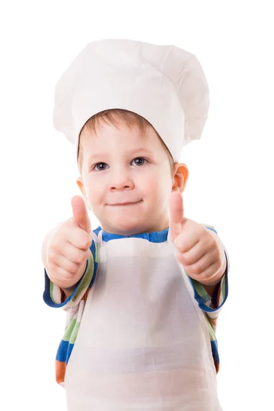 Little cook visar tummen upp skylt — Stockfoto