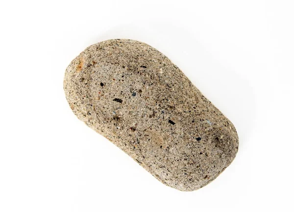 Камінь з моря на білому — стокове фото