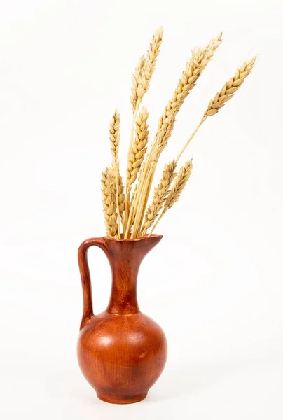 Jar with wheat on white — Stock Photo, Image