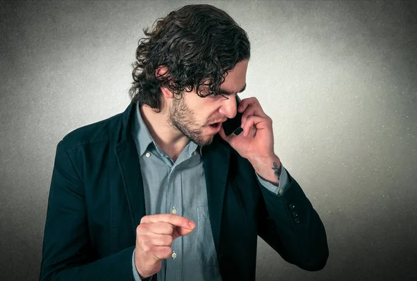Homem zangado ao telefone — Fotografia de Stock
