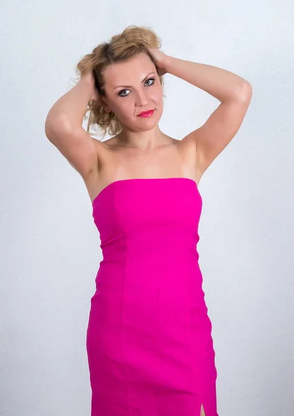 Beautiful blond woman in dress — Stock Photo, Image