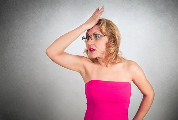 Beautiful blond woman thinking Stock Photo