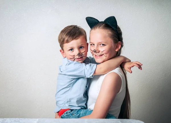 Happy boy with sister having fun — Stock Photo, Image