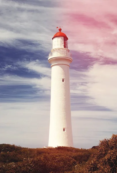 Old lighthouse closeup in sunset — Stock Photo, Image