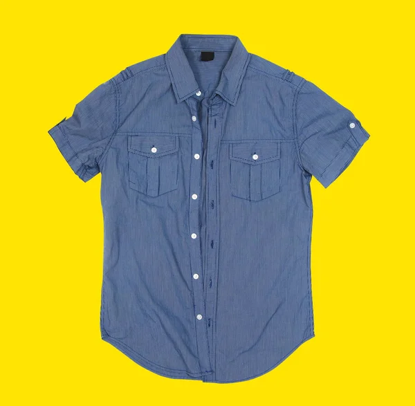 Button shirt on yellow background — Stock Photo, Image