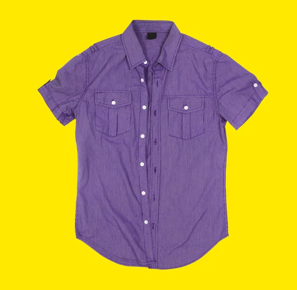 Button shirt on yellow background — Stock Photo, Image