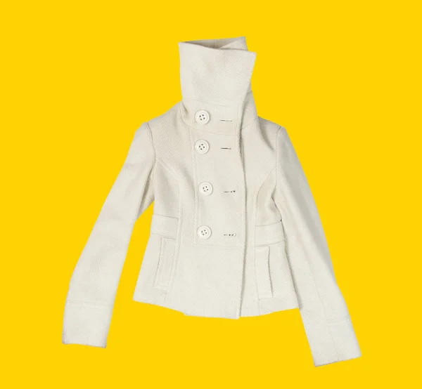 Manteau sur le fond jaune — Photo