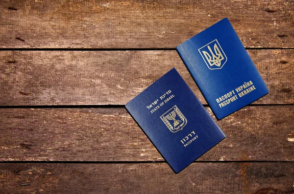 Israel and Ukraine passport on the table