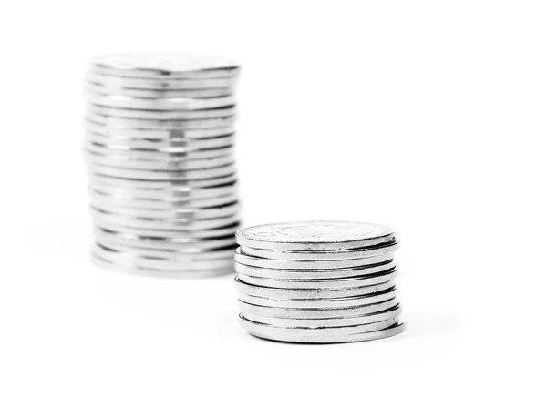 Mønter på den hvide overflade - Stock-foto