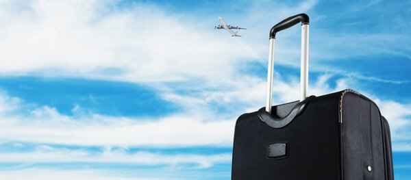 Suitcase with the sky. Travel concept