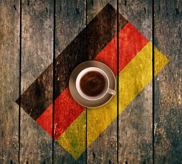 Egy csésze kávé a zászlóval — Stock Fotó