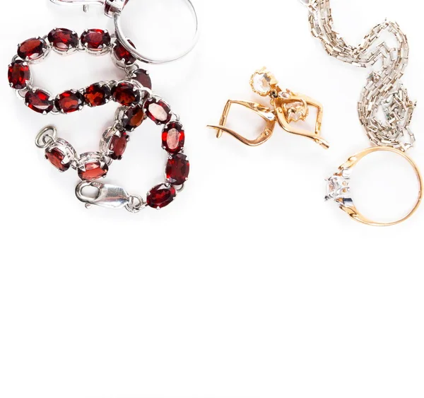 Jewelry with the ruby stones on the white — Stock Photo, Image