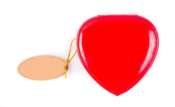 Red gift box in heart shape with the label — Stock Photo, Image