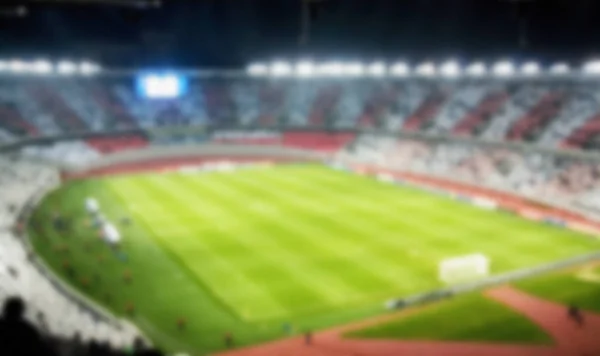 Abstract view of unfocused football stadium — Stock Photo, Image