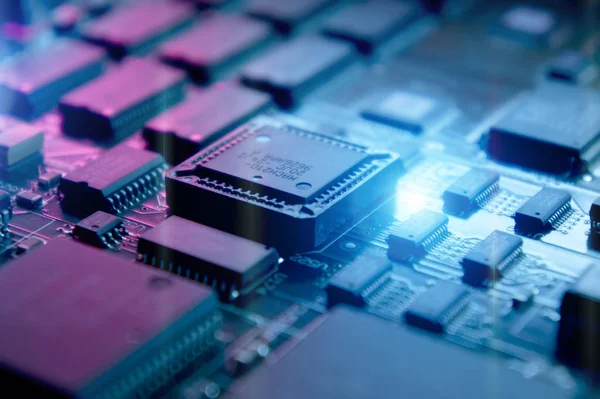 Microchips on a circuit board. Stock Image