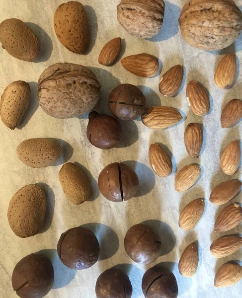 Nuts Randomly Scattered Table — Stock Photo, Image