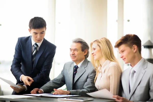 Business team working on their business project together at office — Stock Photo, Image