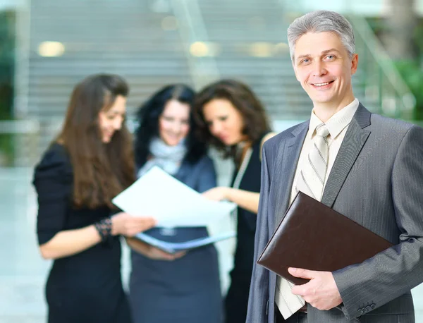 Manager of the company on the background of the office — Stock Photo, Image