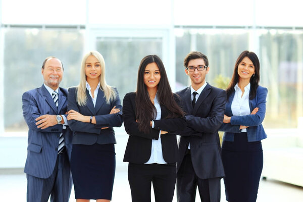 successful and happy business team on office background
