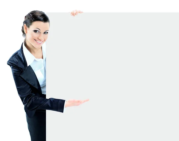 The girl with a big placard smiling and pointing to it  his hand — Stock Photo, Image