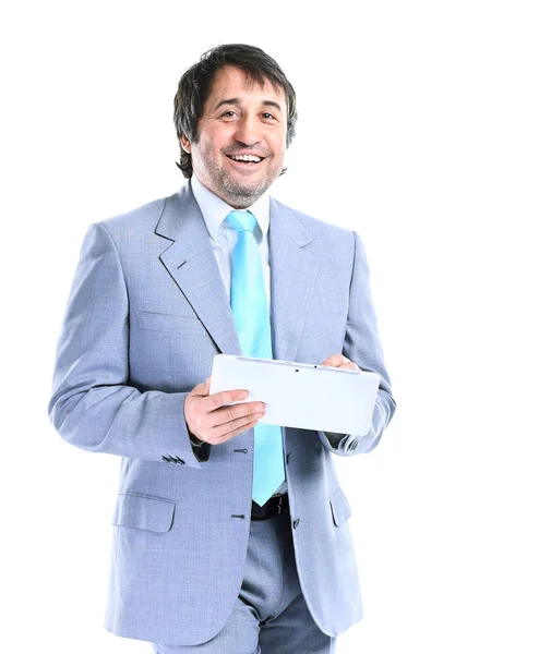 Retrato de un hombre de negocios guapo sonriente con una tableta en las manos —  Fotos de Stock