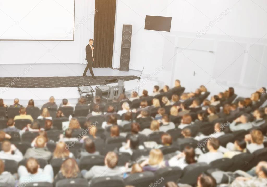 Speaker at a business convention and presentations. The audience on the large number of people
