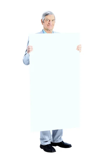 Bonito hombre de negocios a la edad sostiene cartel blanco —  Fotos de Stock
