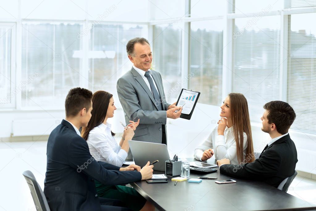 successful businessman and his business team meeting in a modern office