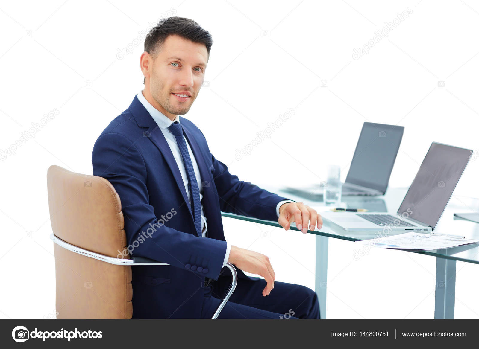 Lawyer Behind A Desk Before An Open Laptop Stock Photo