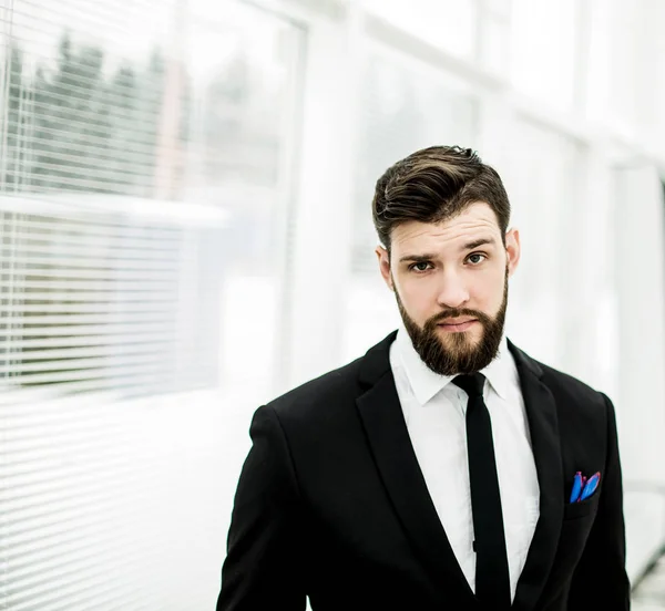 Portrait of a successful Manager near the window in the bright office. — Stock Photo, Image