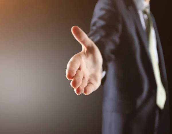 Un hombre de negocios con la mano abierta listo para cerrar un trato —  Fotos de Stock