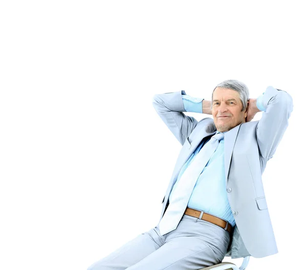 Businessman in age, resting for a break. Isolated on white background. — Stock Photo, Image