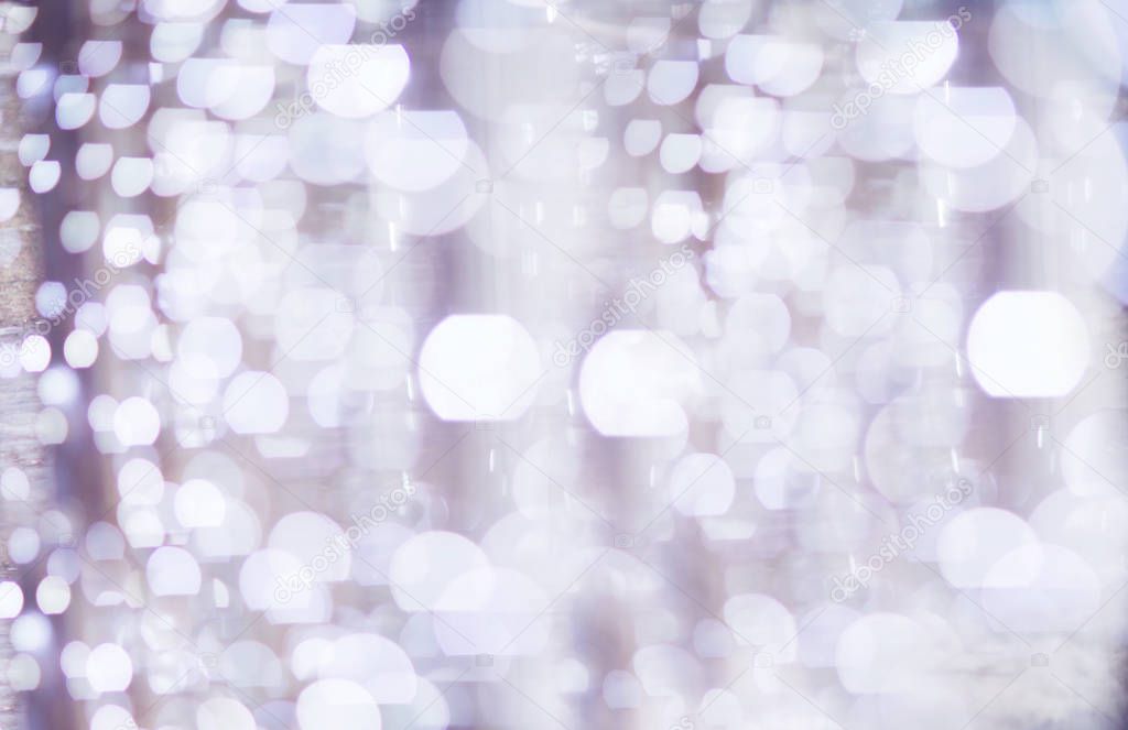 silver white bokeh lights defocused. abstract background