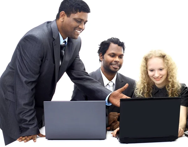 Interracial business team working at laptop isolated background on white — Stock Photo, Image