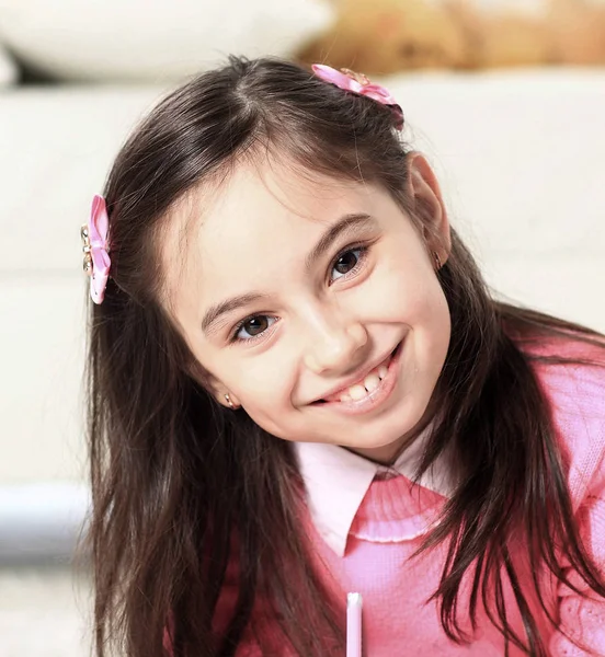 Portrait of a beautiful little girl on the background of childre — Stock Photo, Image