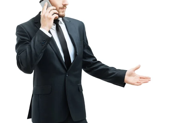 Uomo d'affari è impegnato in un dialogo su un telefono cellulare — Foto Stock