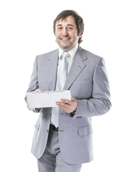 Portrait of confident businessman with digital tablet on white background — Stock Photo, Image