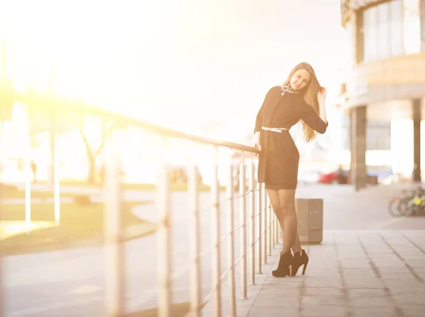 Female manager on the background of an office building — Stock Photo, Image