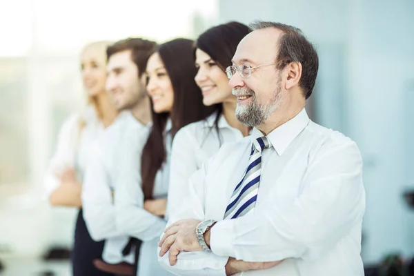 concept of team work-professional business team standing next to each other