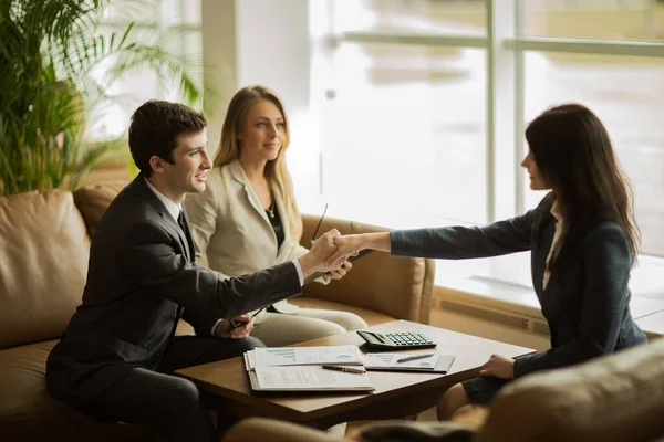 Handshake of business partners after discussing a new financial contract — Stock Photo, Image
