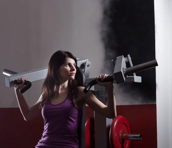 Modern business woman at a fitness lesson in a modern fitness club — Stock Photo, Image