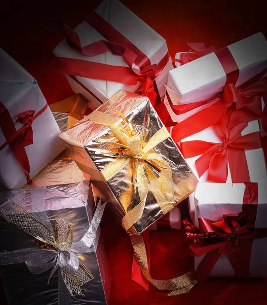 Closeup. colorful gift boxes.isolated on red — Stock Photo, Image