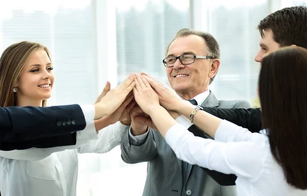 Happy business team celebrating victory in office — Stock Photo, Image