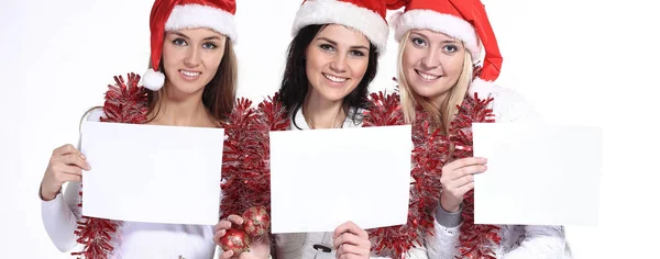 Grupo de estudantes do sexo feminino em trajes de Papai Noel segurando bla — Fotografia de Stock